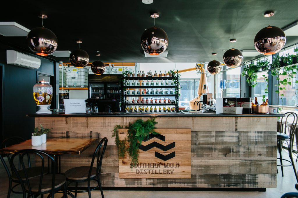 Bar and bottle display inside Southern Wild Distillery in Devonport, Tasmania.